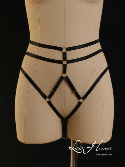 Front view of The Darlene harness panties on a mannequin in black, showcasing the sensual open design.